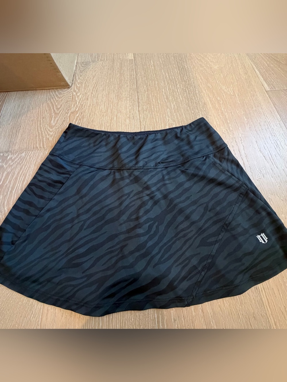 Eleven Women’s Black Zebra-Print Tennis Skirt